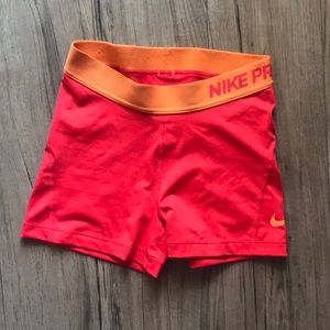 Nike Pro Dri-fit athletic shorts red/orange